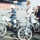 Evel Knievel, center, nattily attired in white leather jumpsuit, trimmed with Stars and Stripes, in 1974.